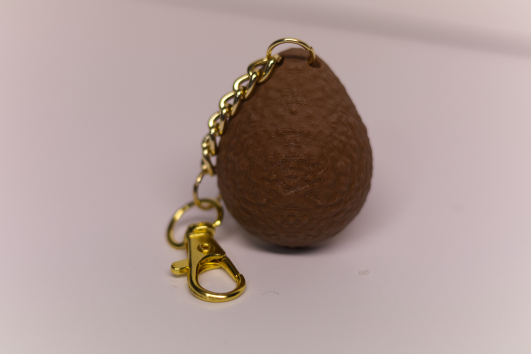 Back of the avocado key chain